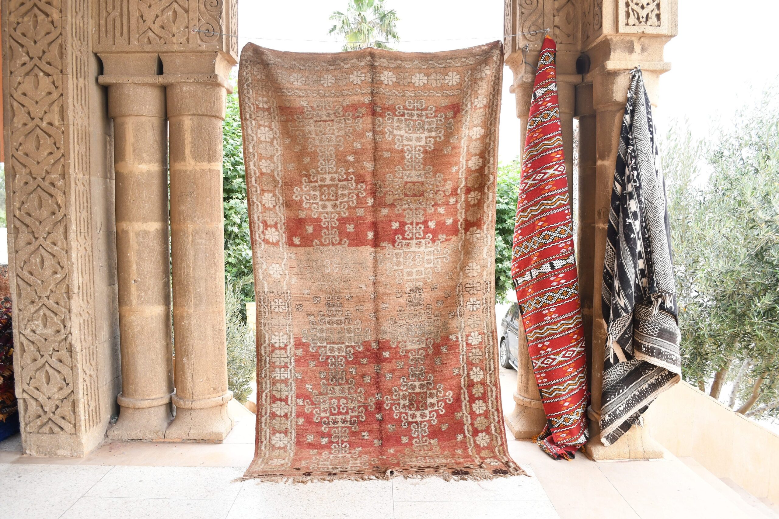 a red and beige rug. il_fullxfull.6065567715_n1u0.jpg