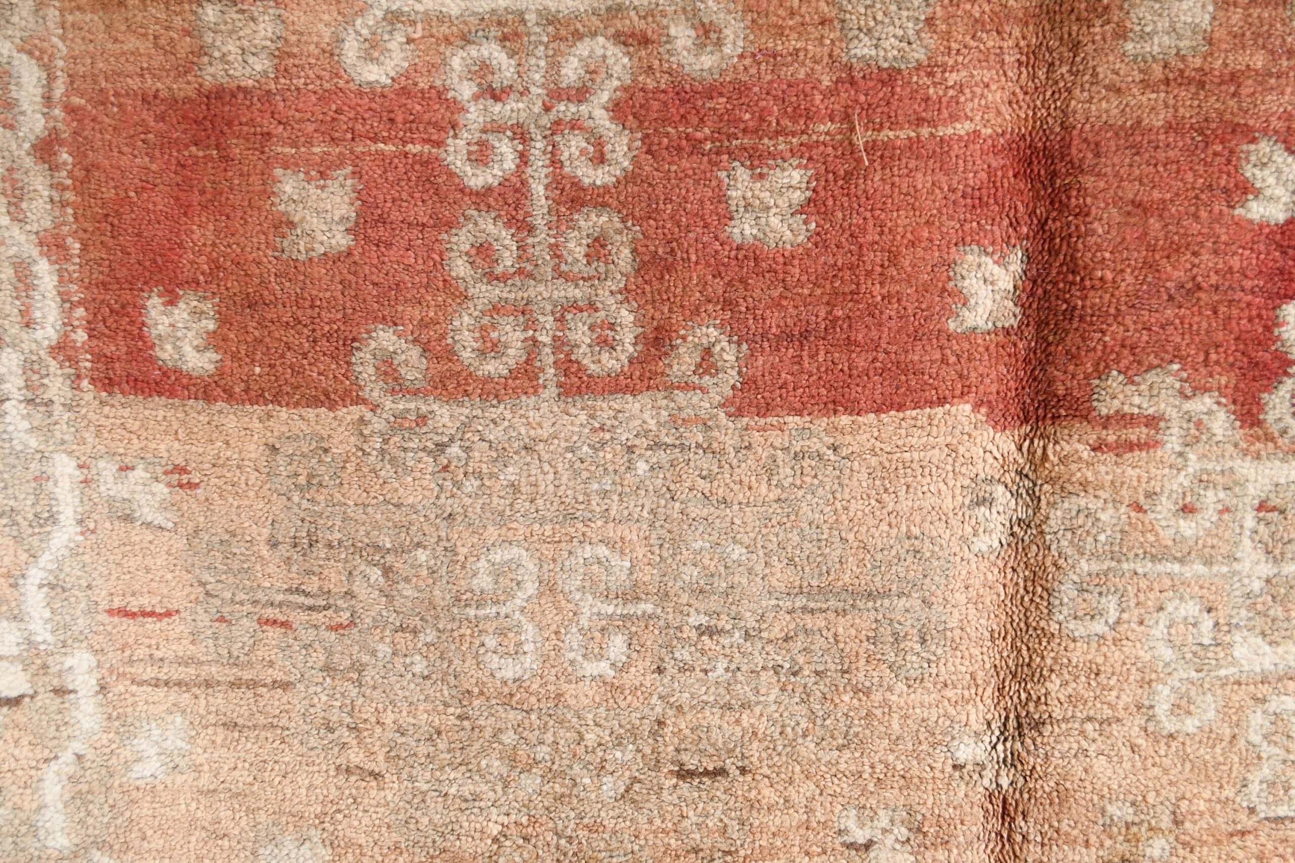 a red and beige rug with a pattern. il_fullxfull.6065567795_t2jj.jpg