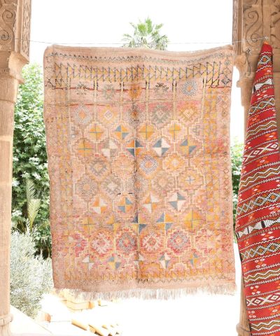 a colorful rug hanging on a wall. il_fullxfull.6065572499_7yrk.jpg