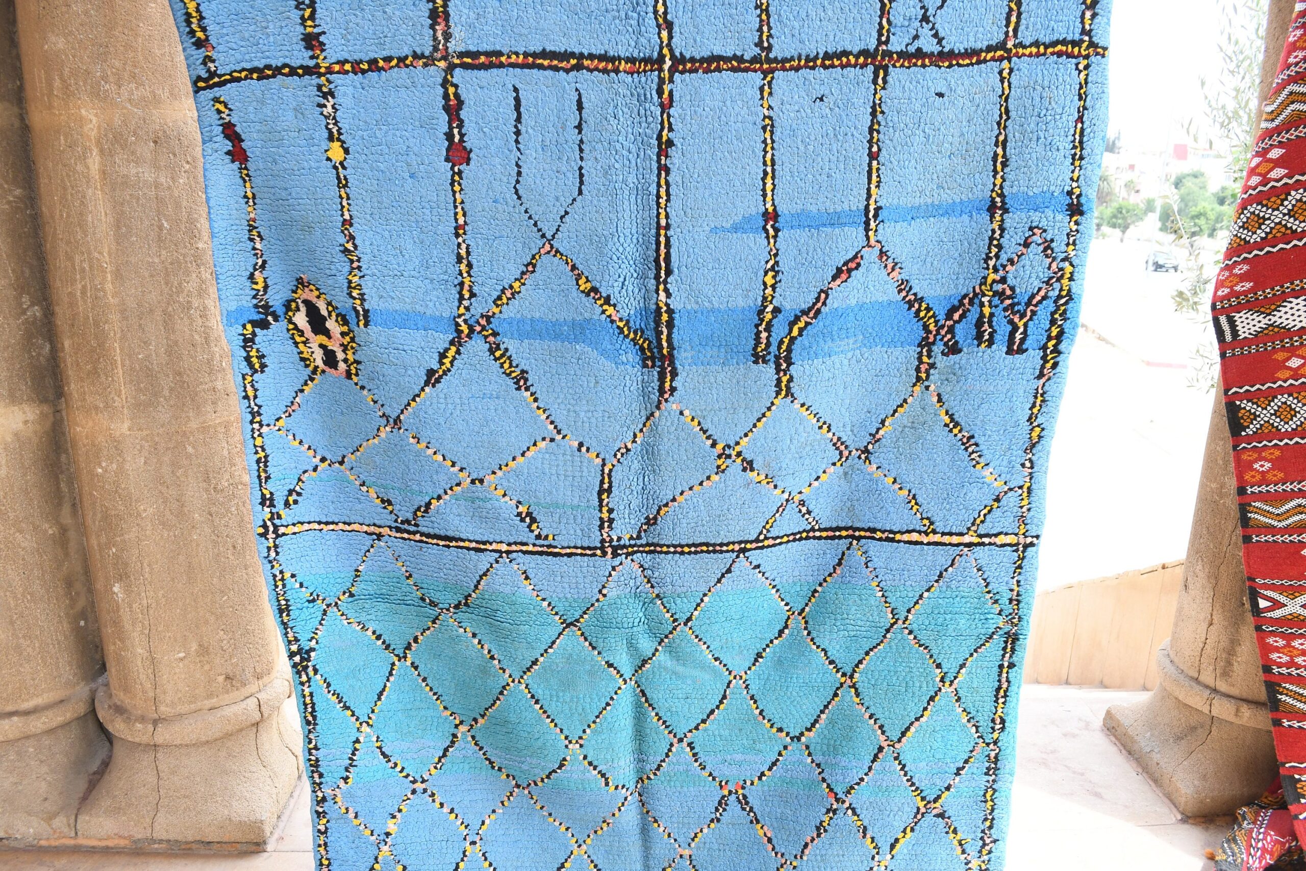 a blue and red moroccan rug. il_fullxfull.6065574321_jubt.jpg