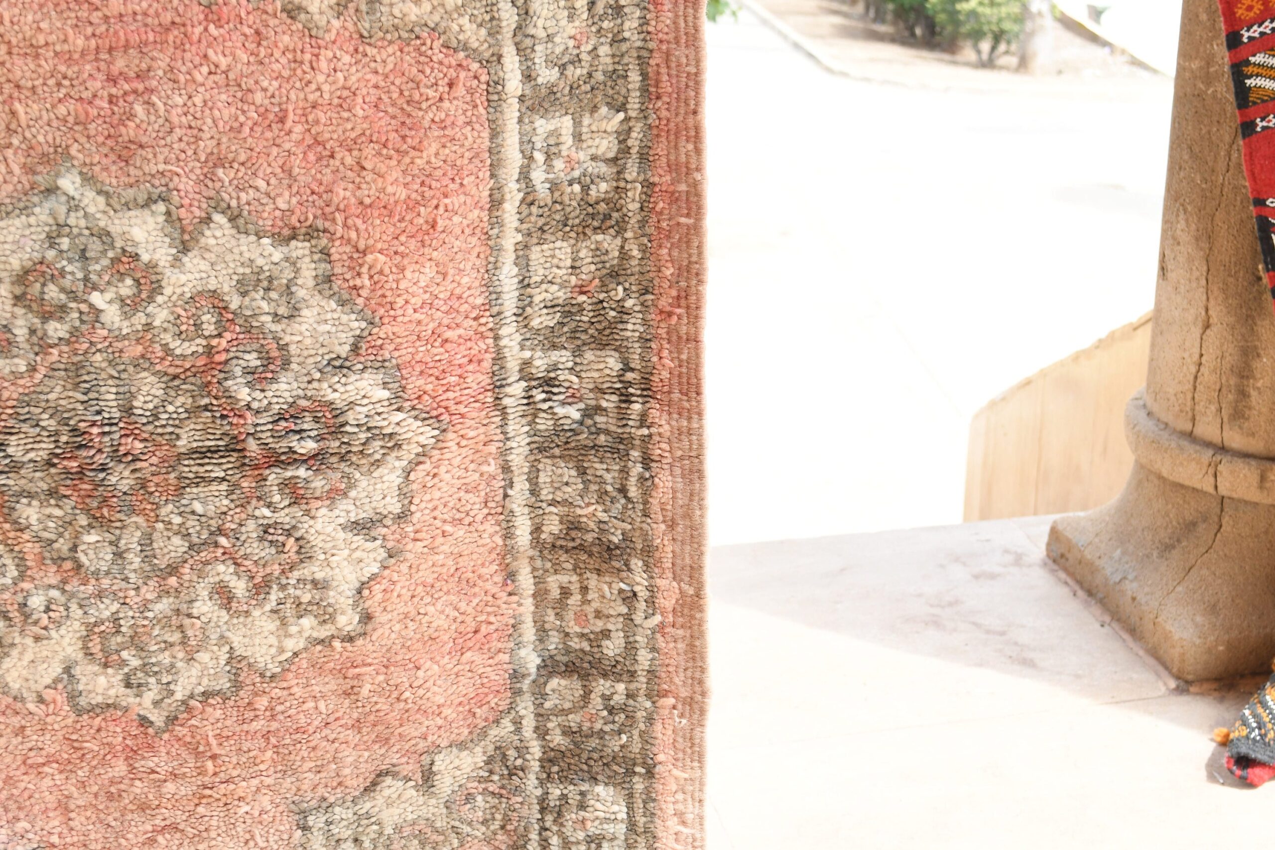 a woman is standing in a doorway with a red rug. il_fullxfull.6065575679_e0nq.jpg