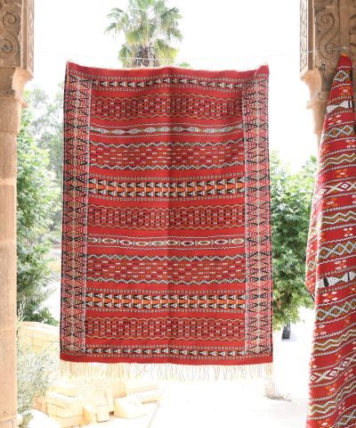 a red and black rug hanging from a doorway. il_fullxfull.6065626757_7uio.jpg