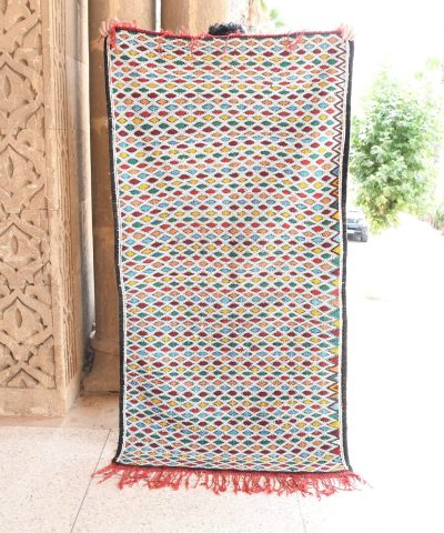 a colorful rug is on display in a room. il_fullxfull.6065632045_cdp5.jpg