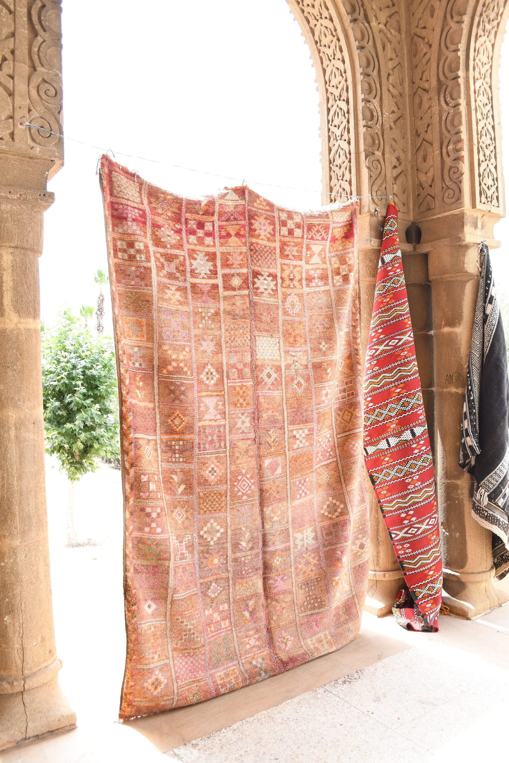 a woman is standing in front of a large rug. il_fullxfull.6071162715_cgs3.jpg