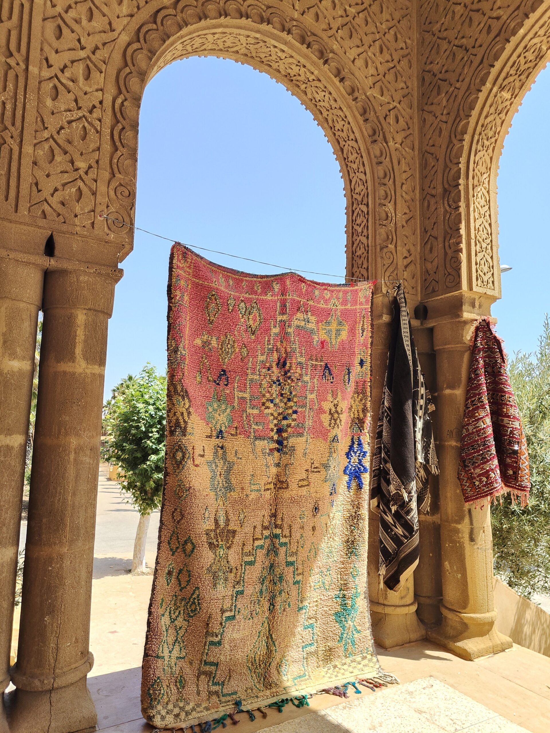 a colorful rug hanging on a wall. il_fullxfull.6071170575_i0gh.jpg