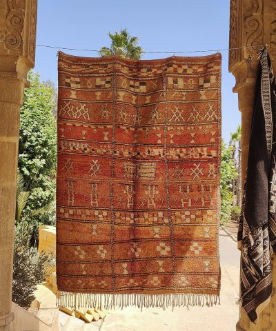 a red rug hanging on a wall. il_fullxfull.6071180991_r3oz.jpg