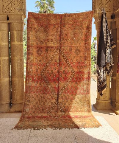 a rug hanging on a wall in a room. il_fullxfull.6071191535_6dkf.jpg