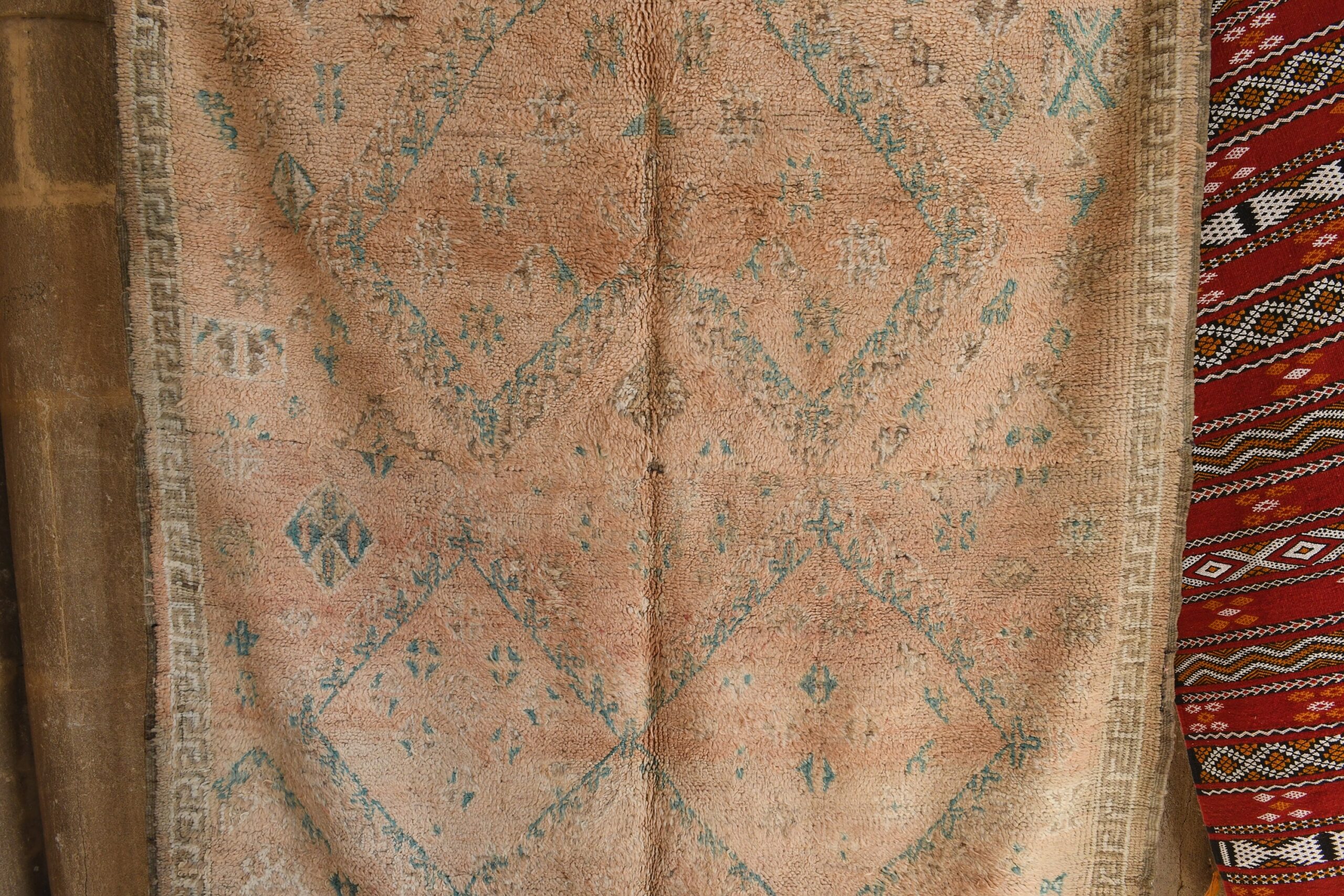 a rug hanging on a wall. il_fullxfull.6073934477_s3q2.jpg