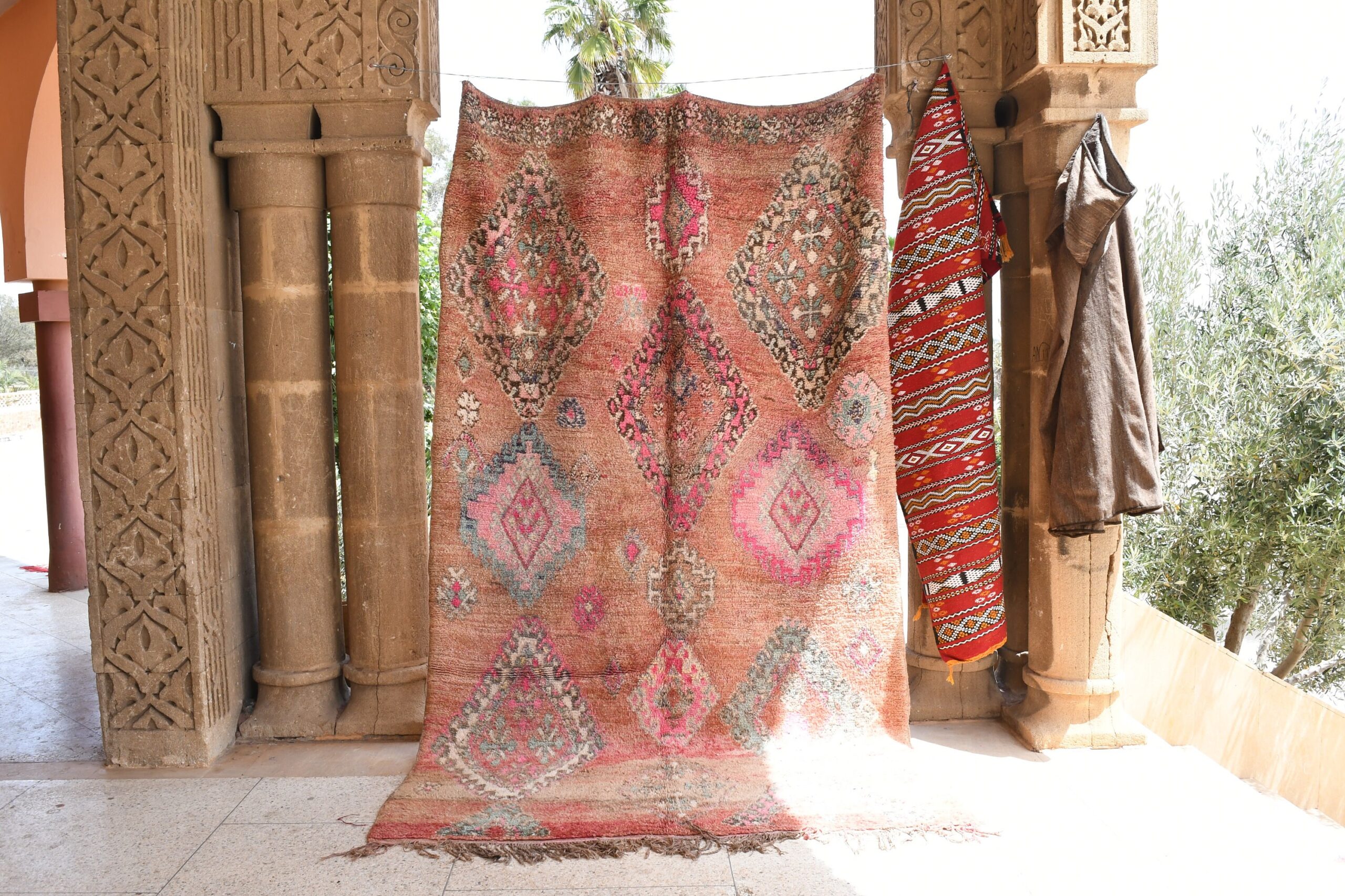 a pink and red rug. il_fullxfull.6073940493_8568.jpg