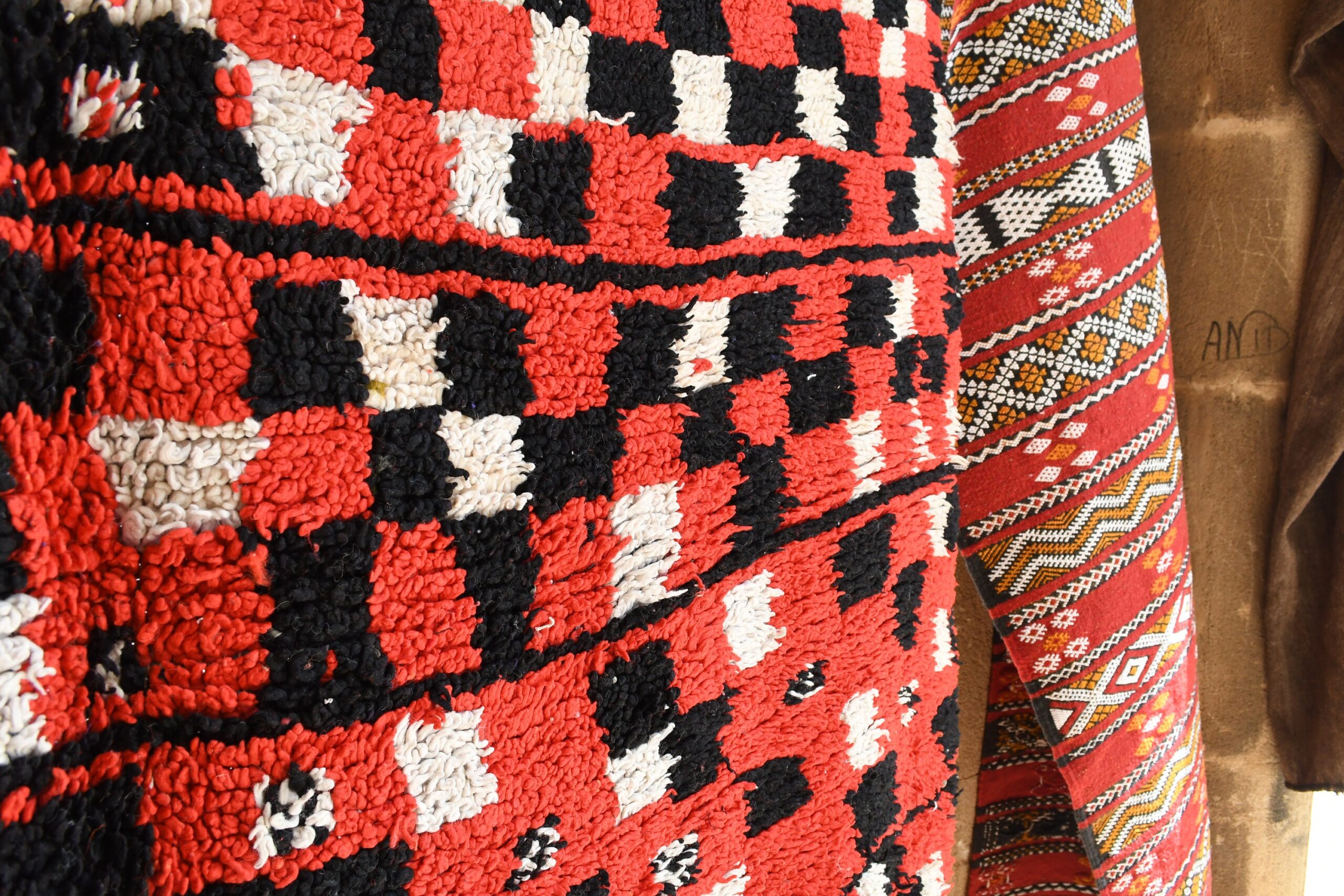 a woman wearing a red and black sweater. il_fullxfull.6073975161_9tyn.jpg