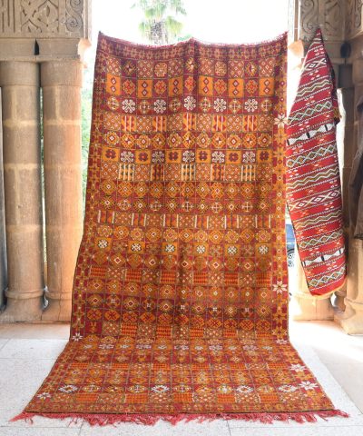 a colorful rug in a room with a large window. il_fullxfull.6076124797_5tlo.jpg