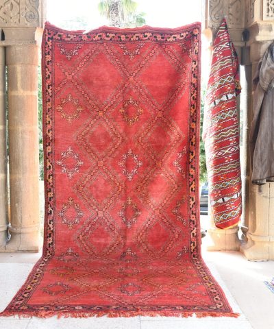 a red rug is on display in a room. il_fullxfull.6076131017_qp34.jpg