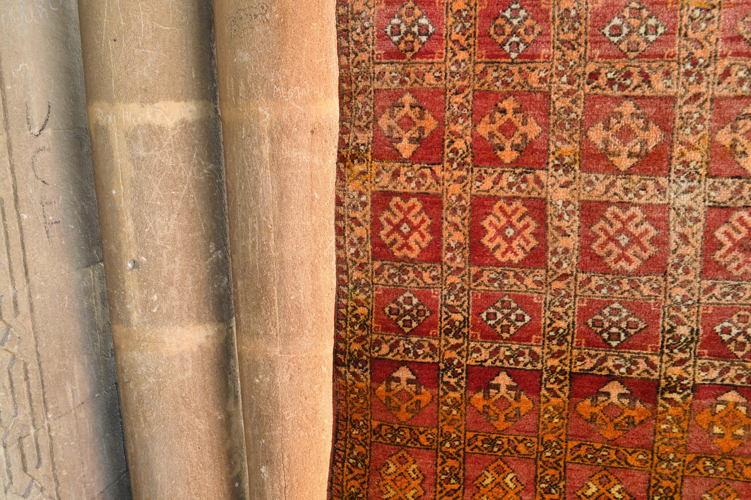 a cat sitting on a rug in a room. il_fullxfull.6076134437_96os.jpg