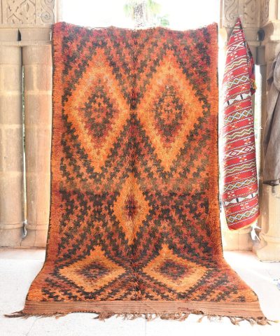 a rug is hanging on a wall. il_fullxfull.6076138035_3ks7.jpg