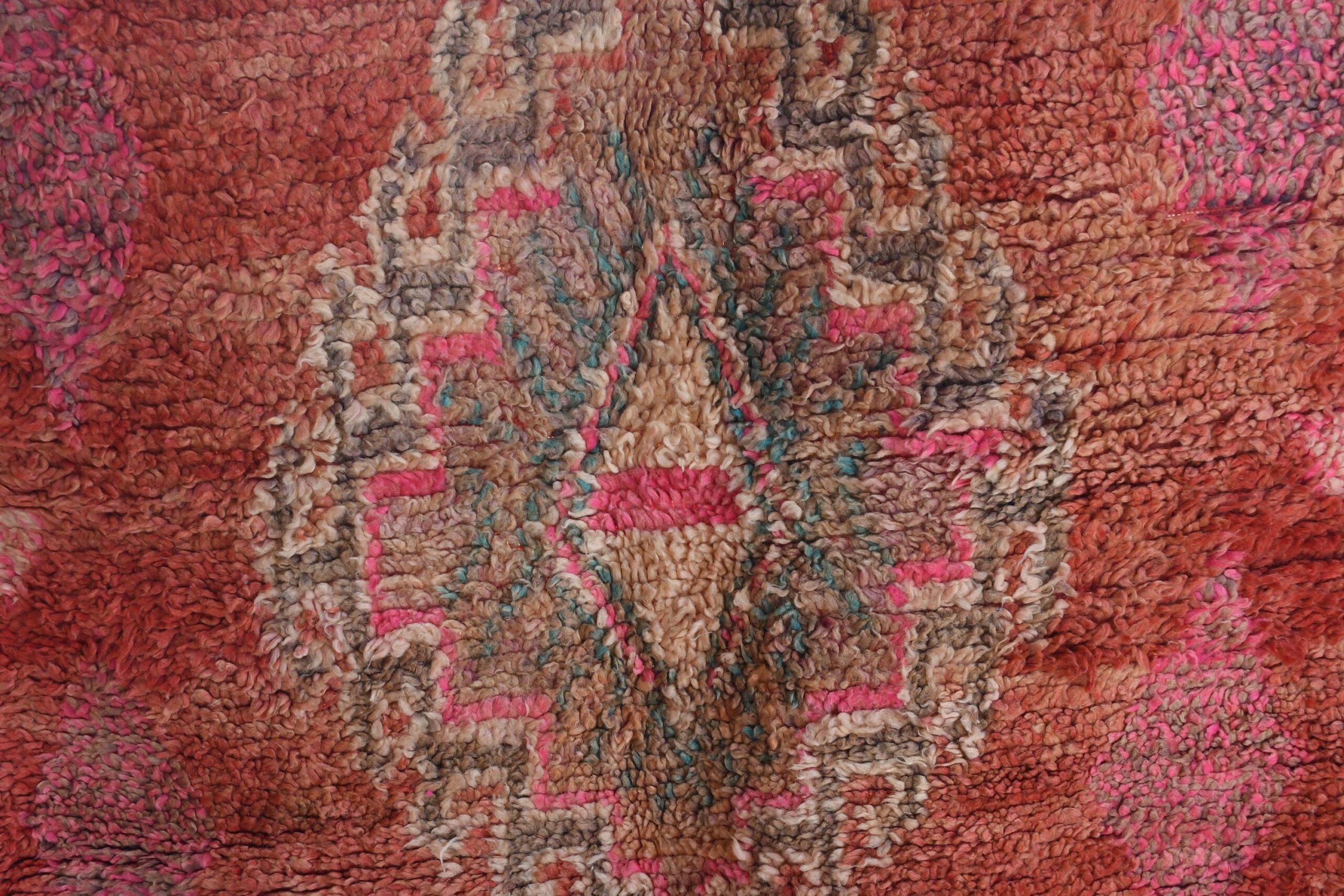 a rug with a red and pink design. il_fullxfull.6076138737_njum.jpg