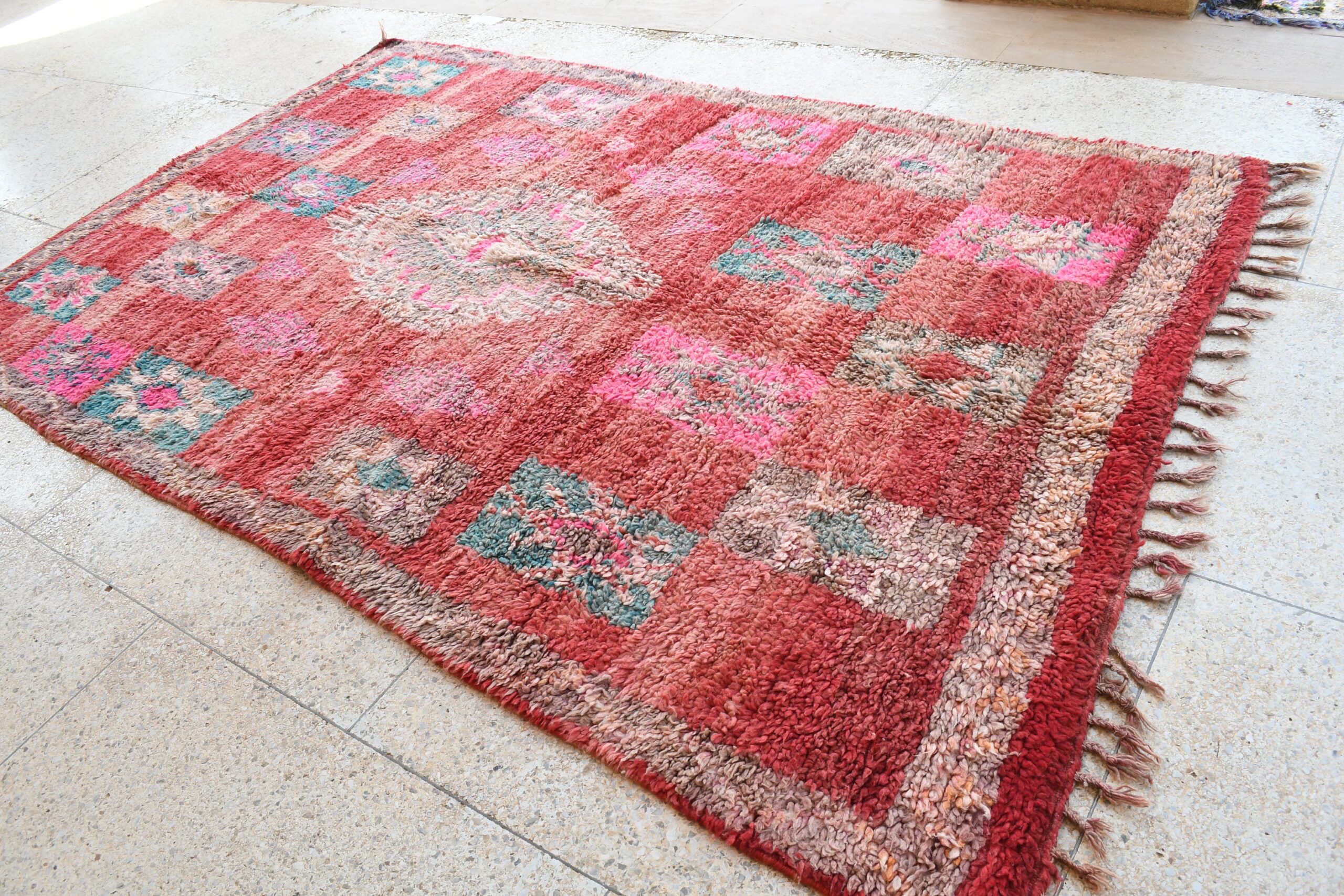 a red rug with a floral design on it. il_fullxfull.6076139219_h7mx.jpg