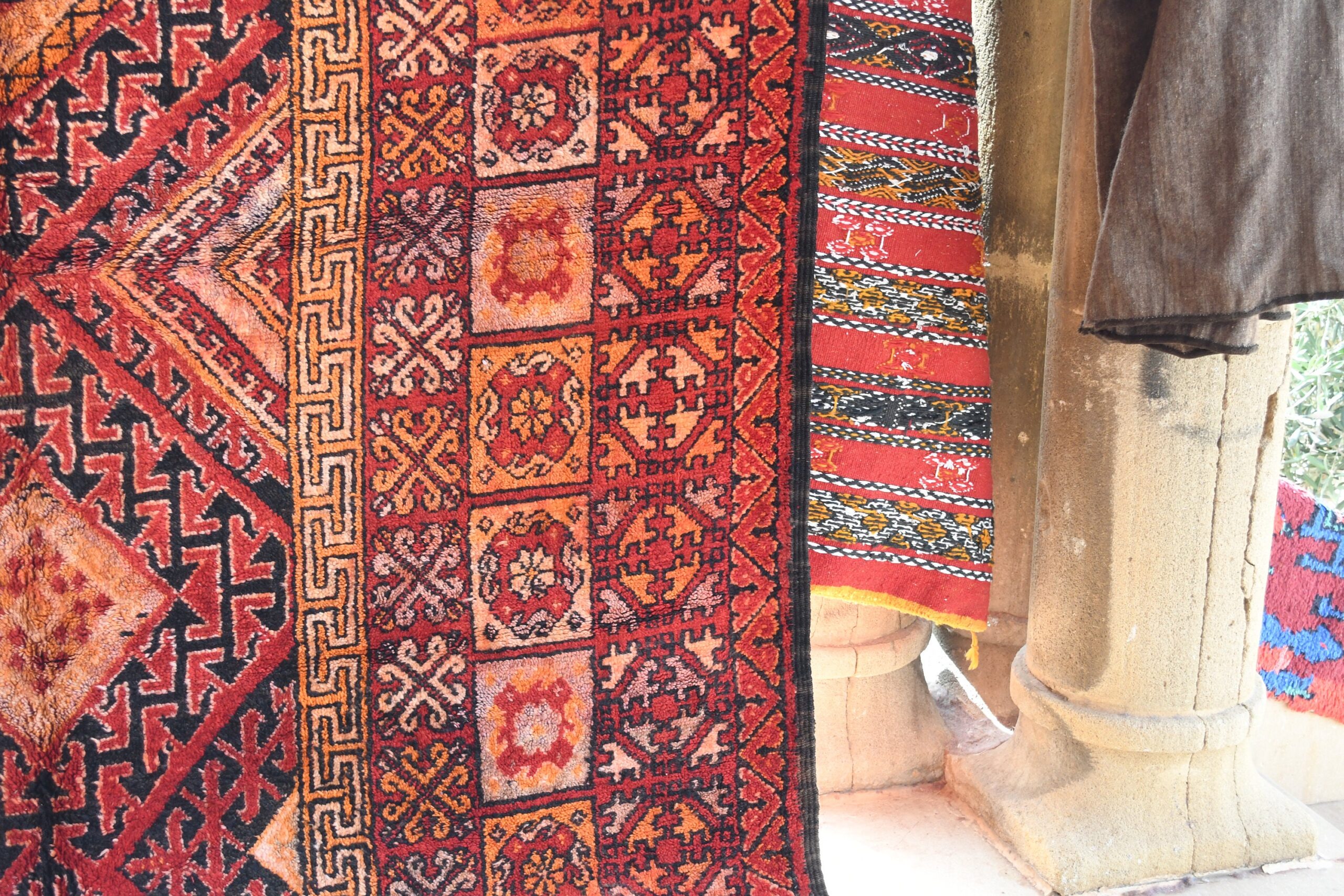 a red and black rug. il_fullxfull.6076141767_nmah.jpg