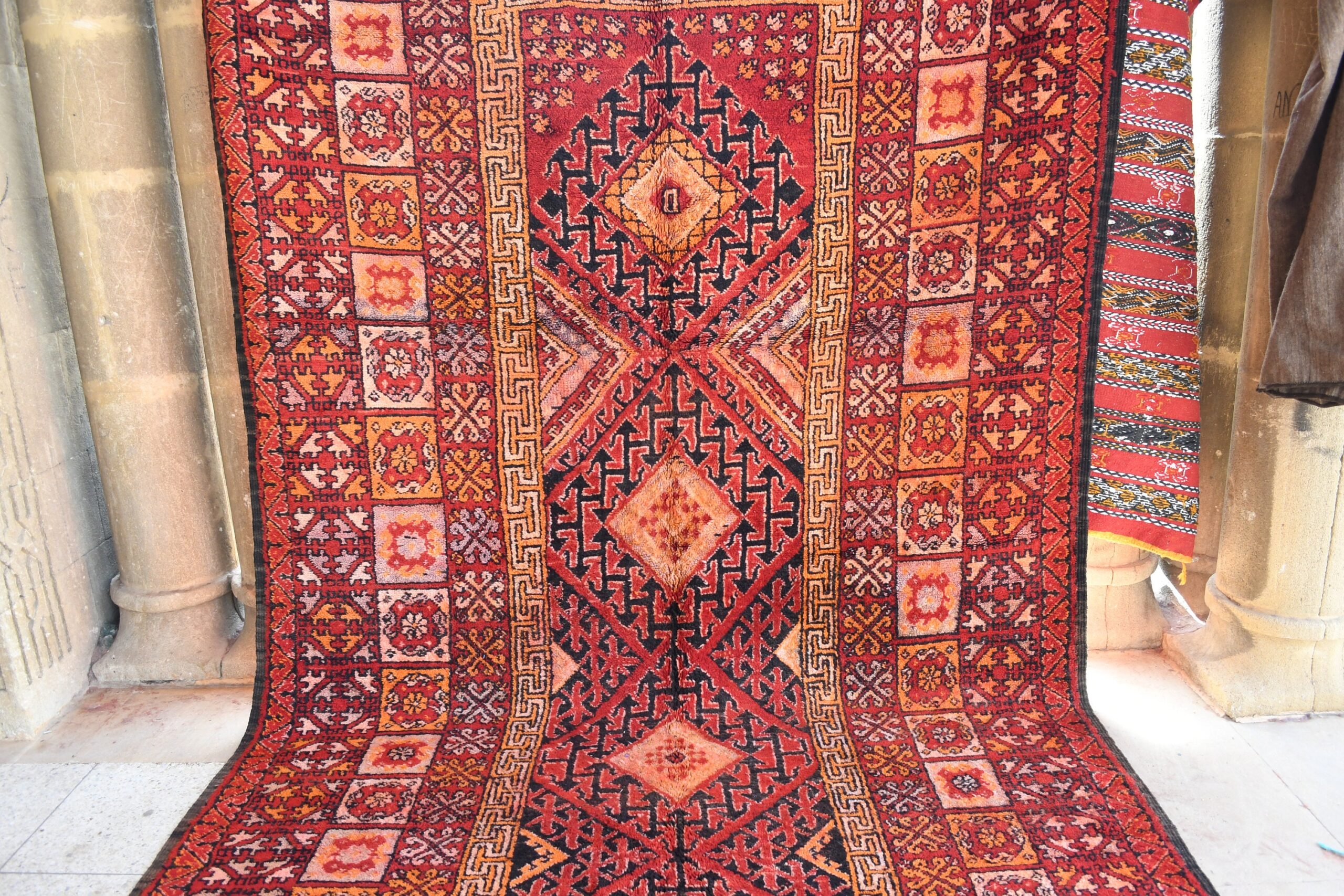 a large antique persian rug. il_fullxfull.6076142083_9kqm.jpg