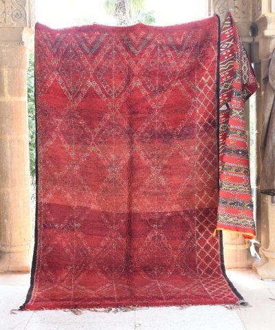 a red rug hanging on a wall. il_fullxfull.6076145475_9cm9.jpg