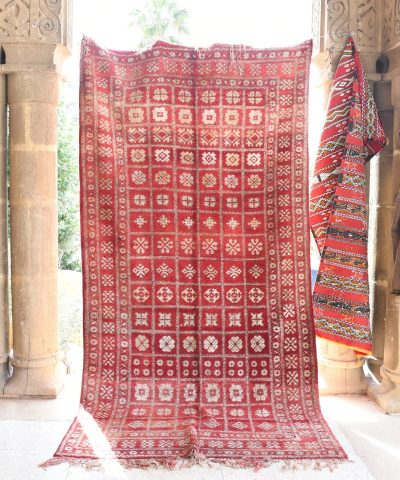 a red rug is hanging in a doorway. il_fullxfull.6076148161_rmey.jpg