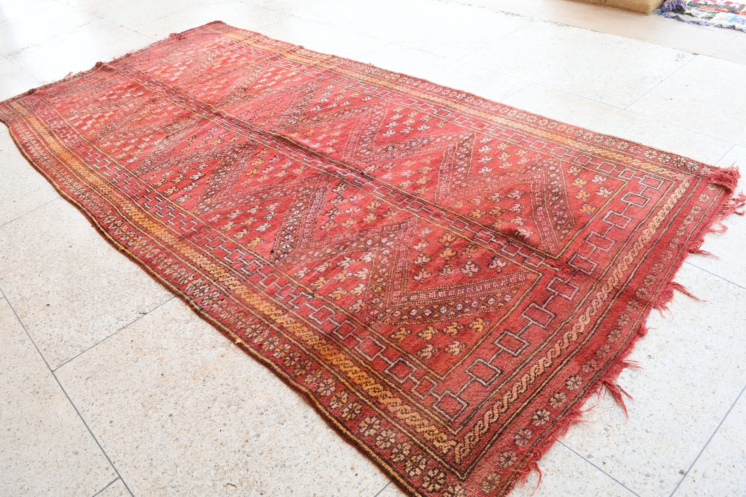 a red rug with a pattern on it. il_fullxfull.6076153439_8nvd.jpg