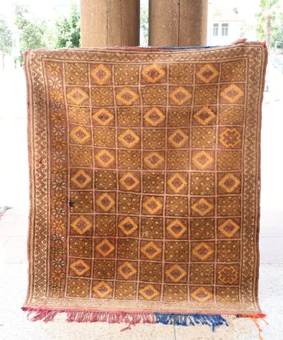 a large rug on a sidewalk. il_fullxfull.6076160227_3xme.jpg