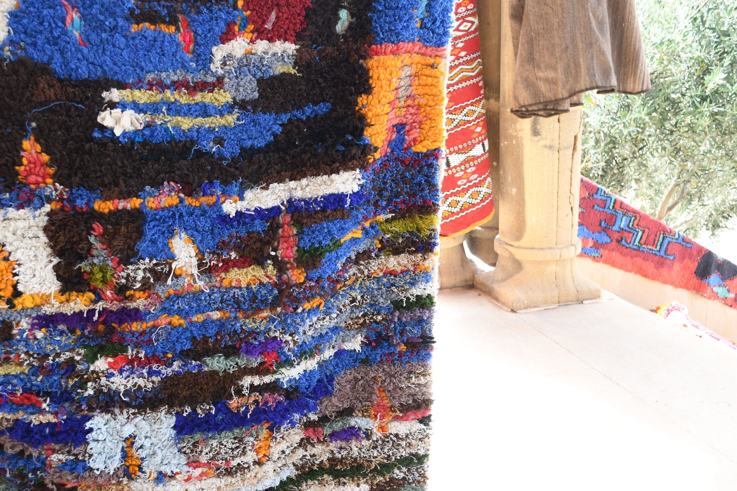 a colorful rug with a cat on it. il_fullxfull.6076162565_2476.jpg