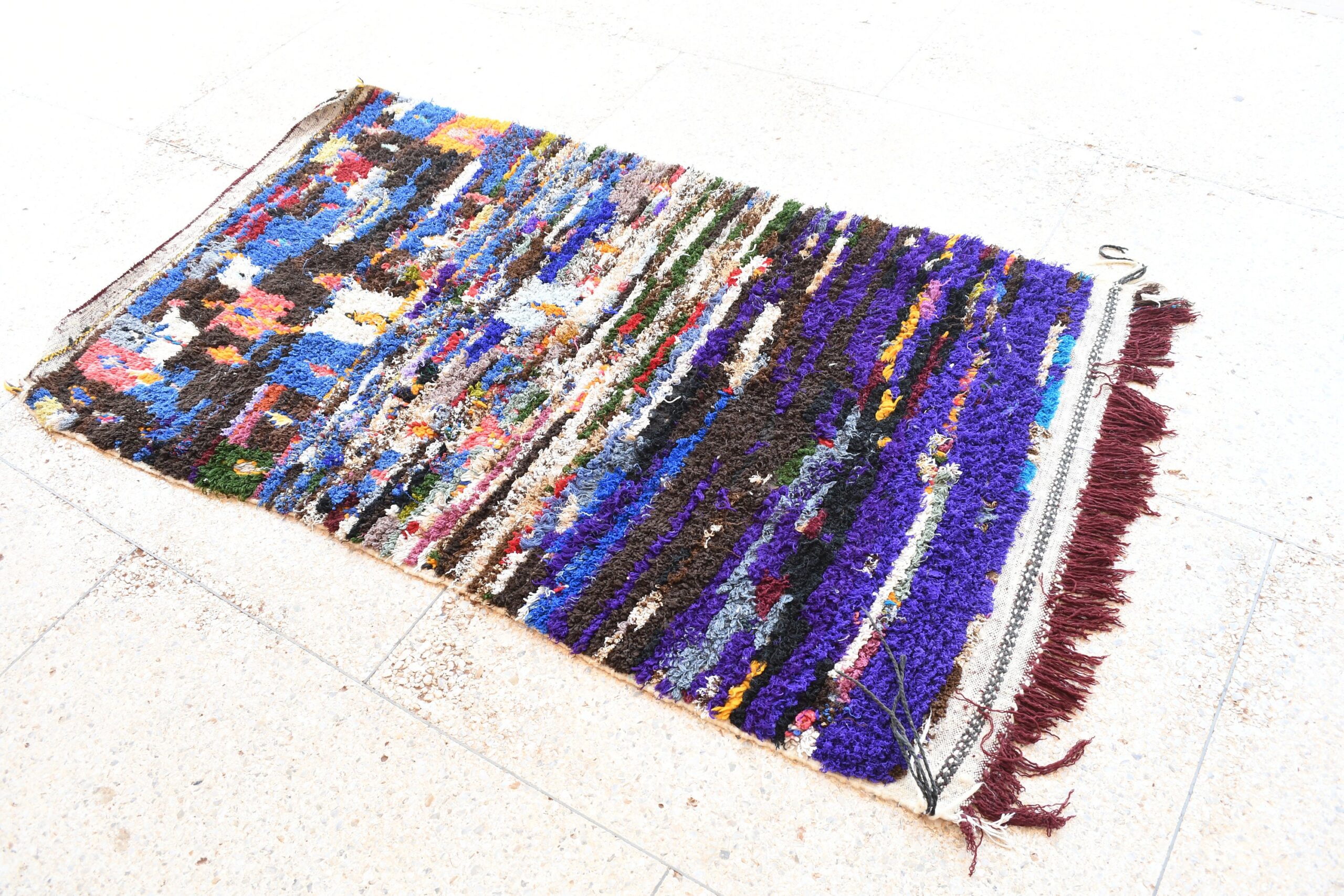 a rug with a colorful pattern on it. il_fullxfull.6076163115_3t0u.jpg