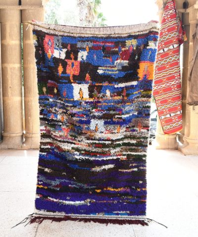 a colorful rug hanging on a wall. il_fullxfull.6076163427_tgik.jpg