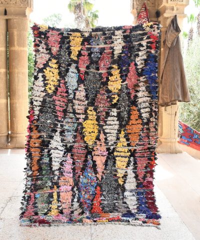 a pile of colorful rugs in a room. il_fullxfull.6076164843_8m2d.jpg