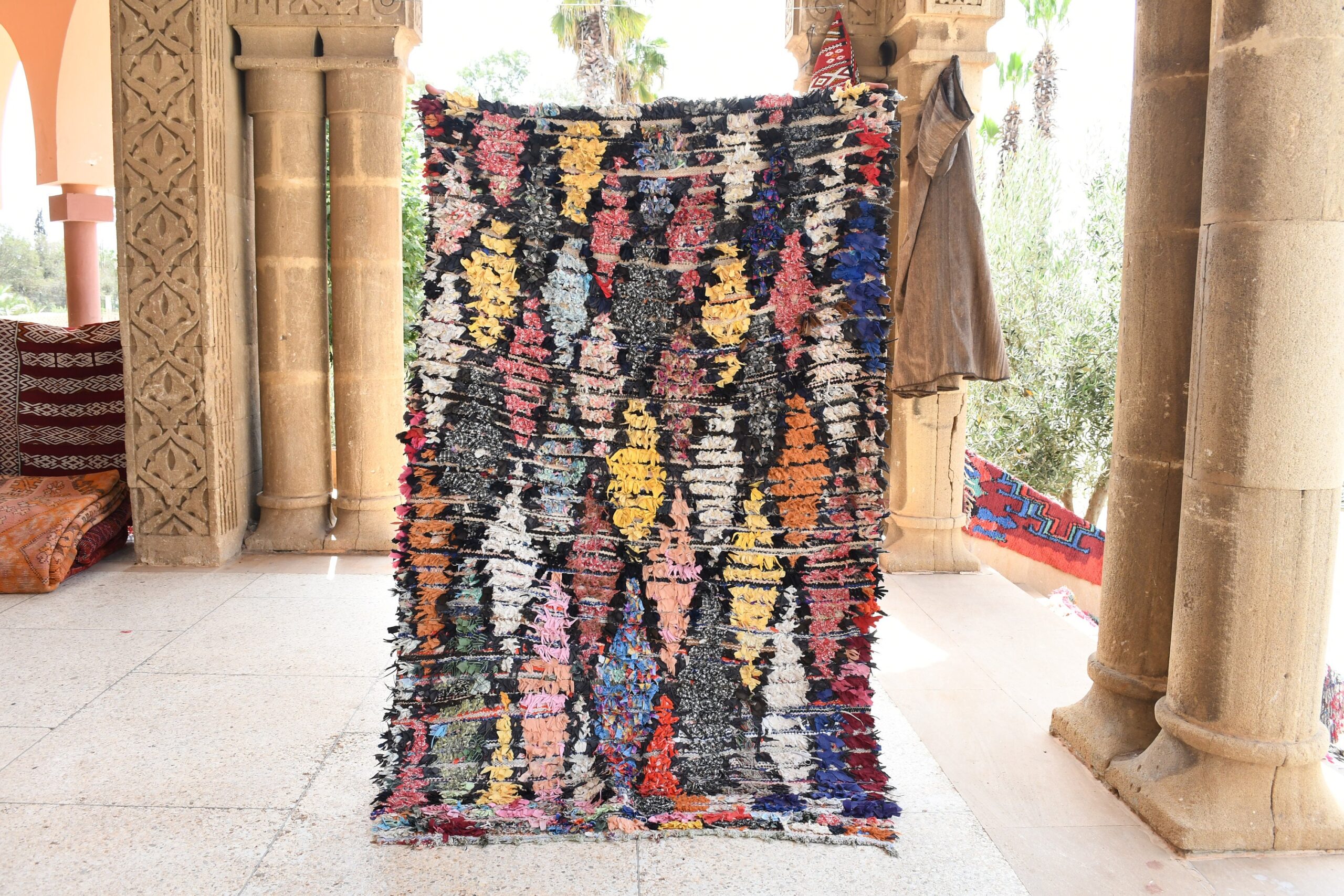 a pile of colorful rugs in a room. il_fullxfull.6076164843_8m2d.jpg