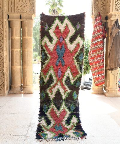 a colorful rug is hanging in a room. il_fullxfull.6076166353_e0mo.jpg