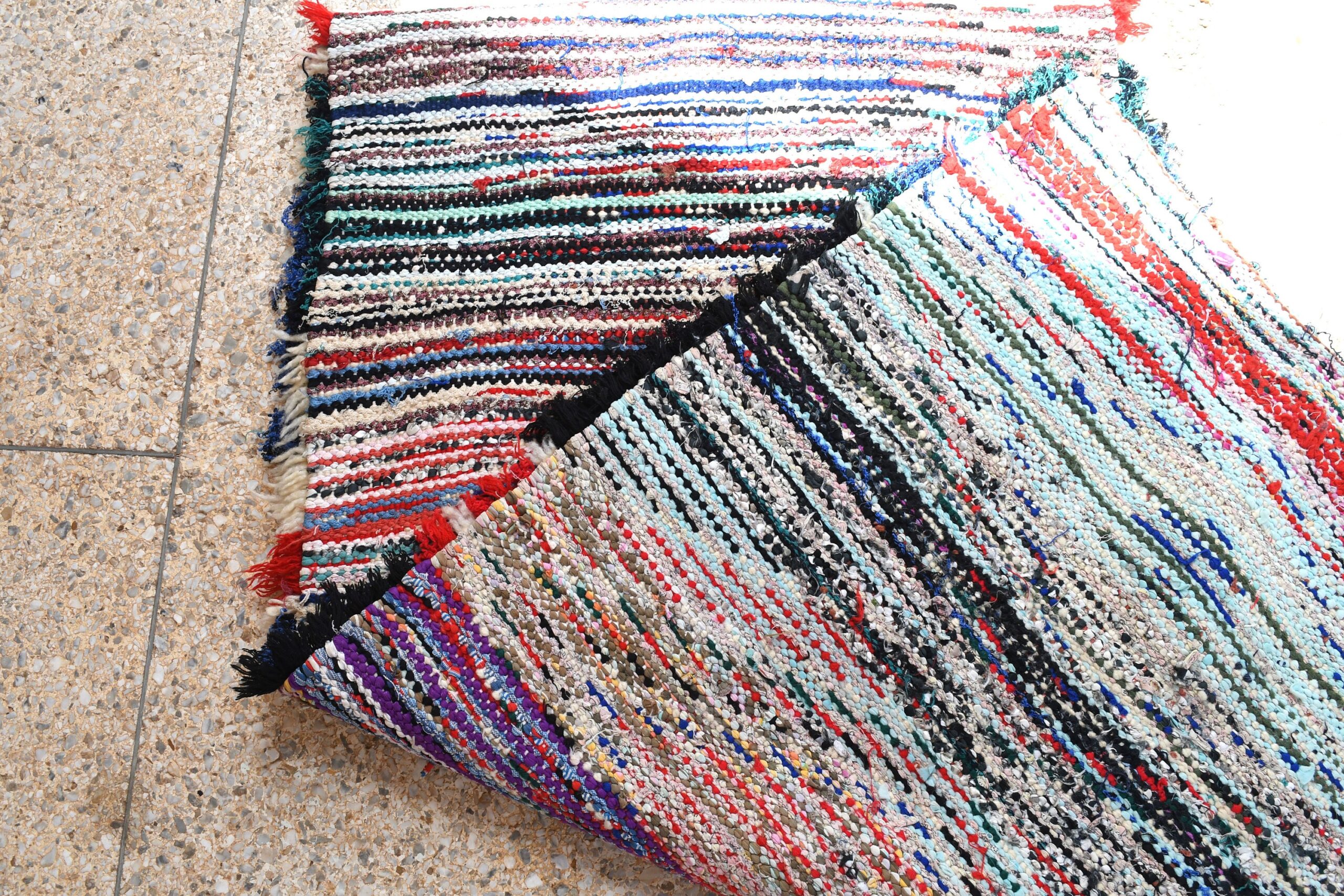 a pile of colorful rugs on the floor. il_fullxfull.6076169047_8msd.jpg