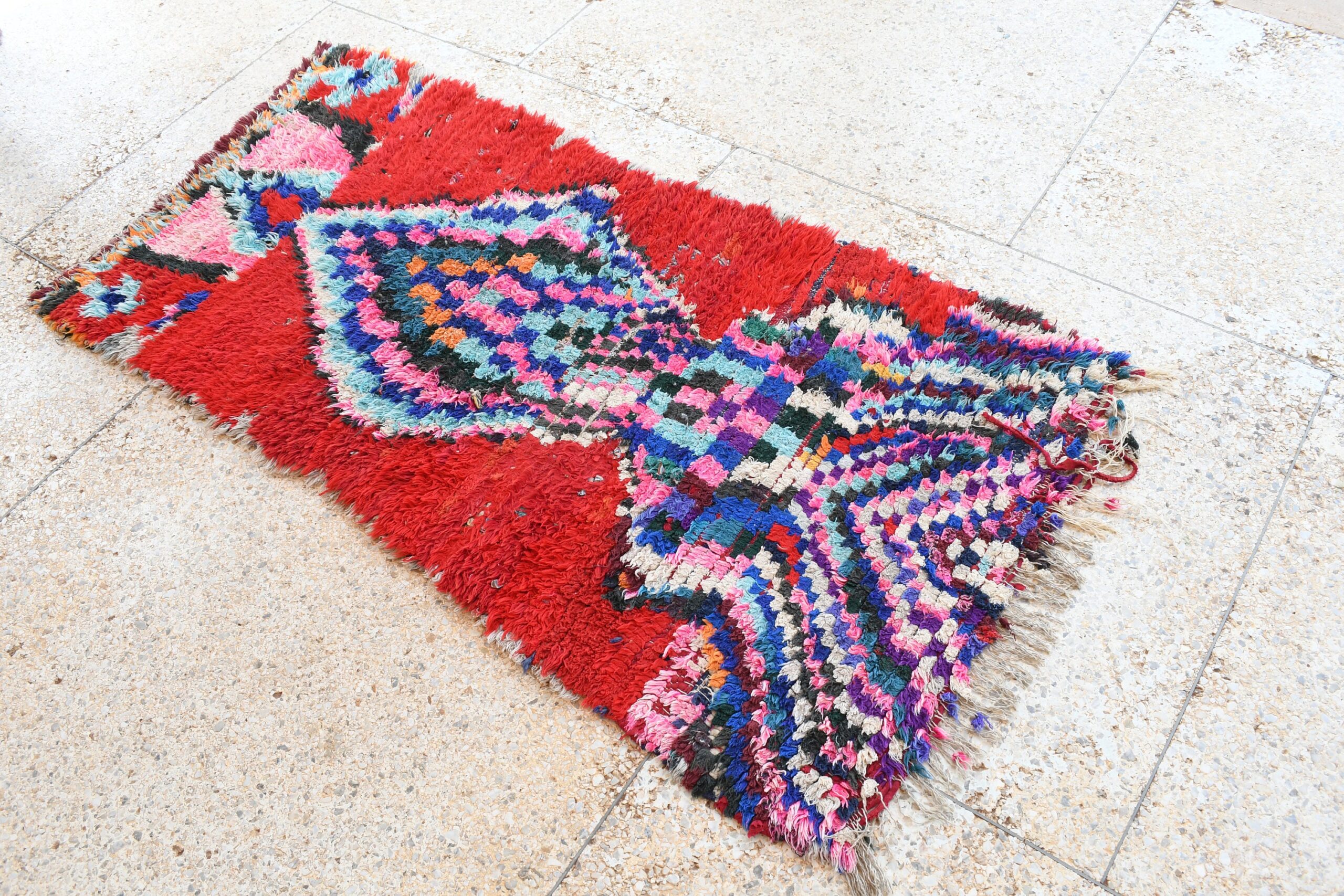 a red rug with a pattern on it. il_fullxfull.6076170507_g107.jpg