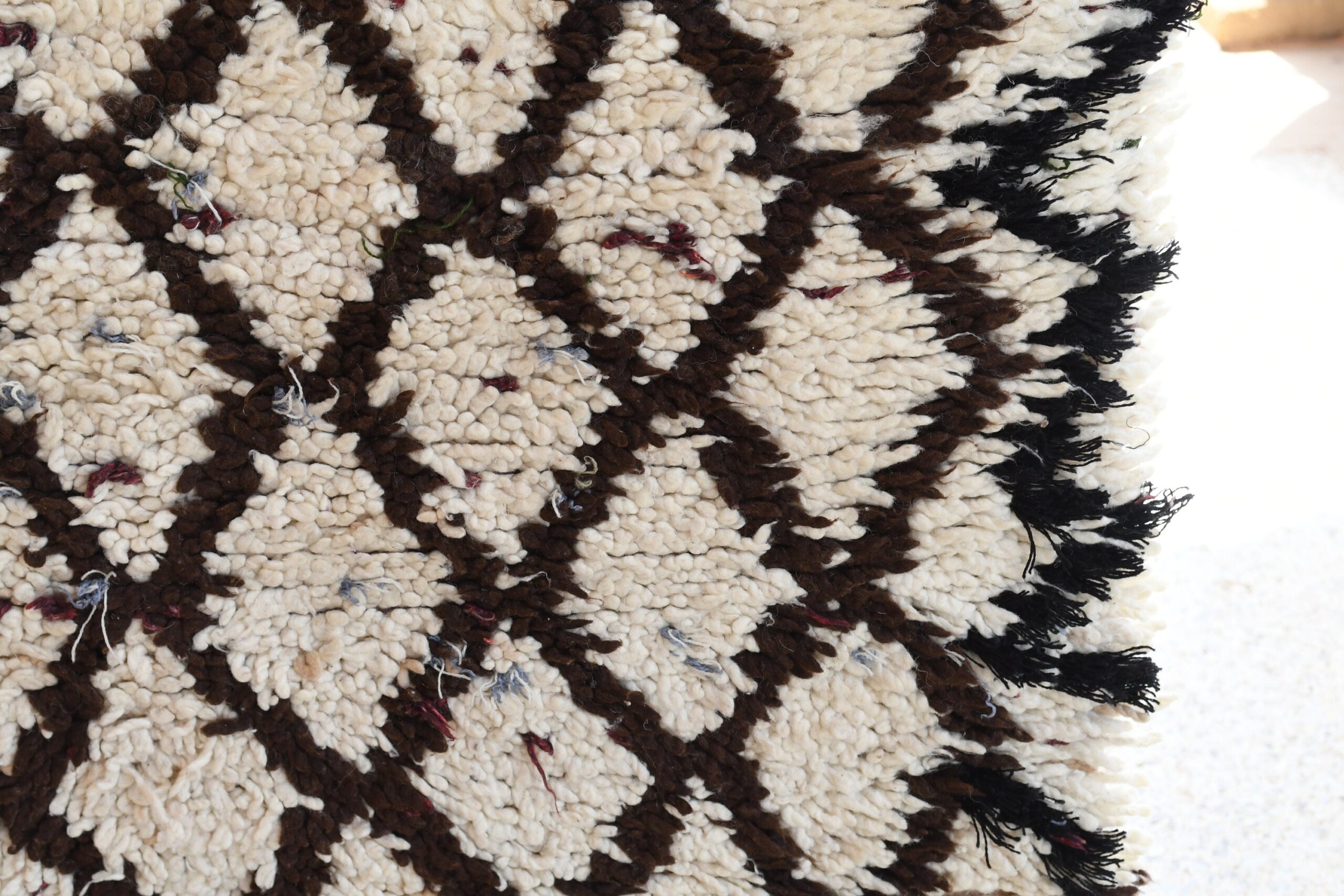 a close up of a rug with a black and white pattern. il_fullxfull.6076181111_g54i.jpg