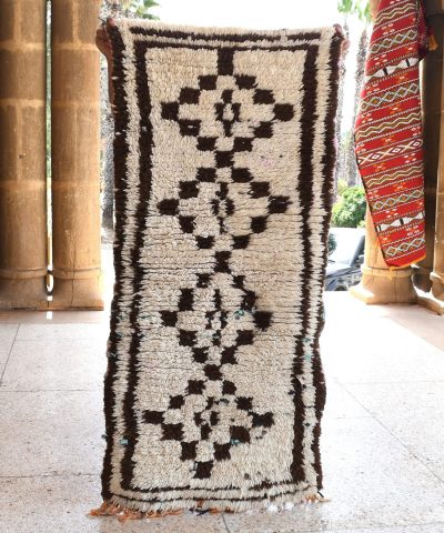 a rug is hanging on a wall. il_fullxfull.6076184235_9uq1.jpg