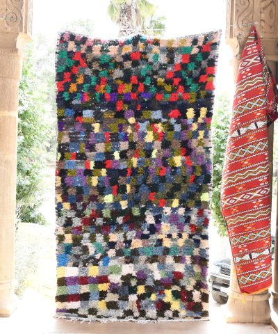 a colorful rug hanging on a wall. il_fullxfull.6076189979_lta7.jpg