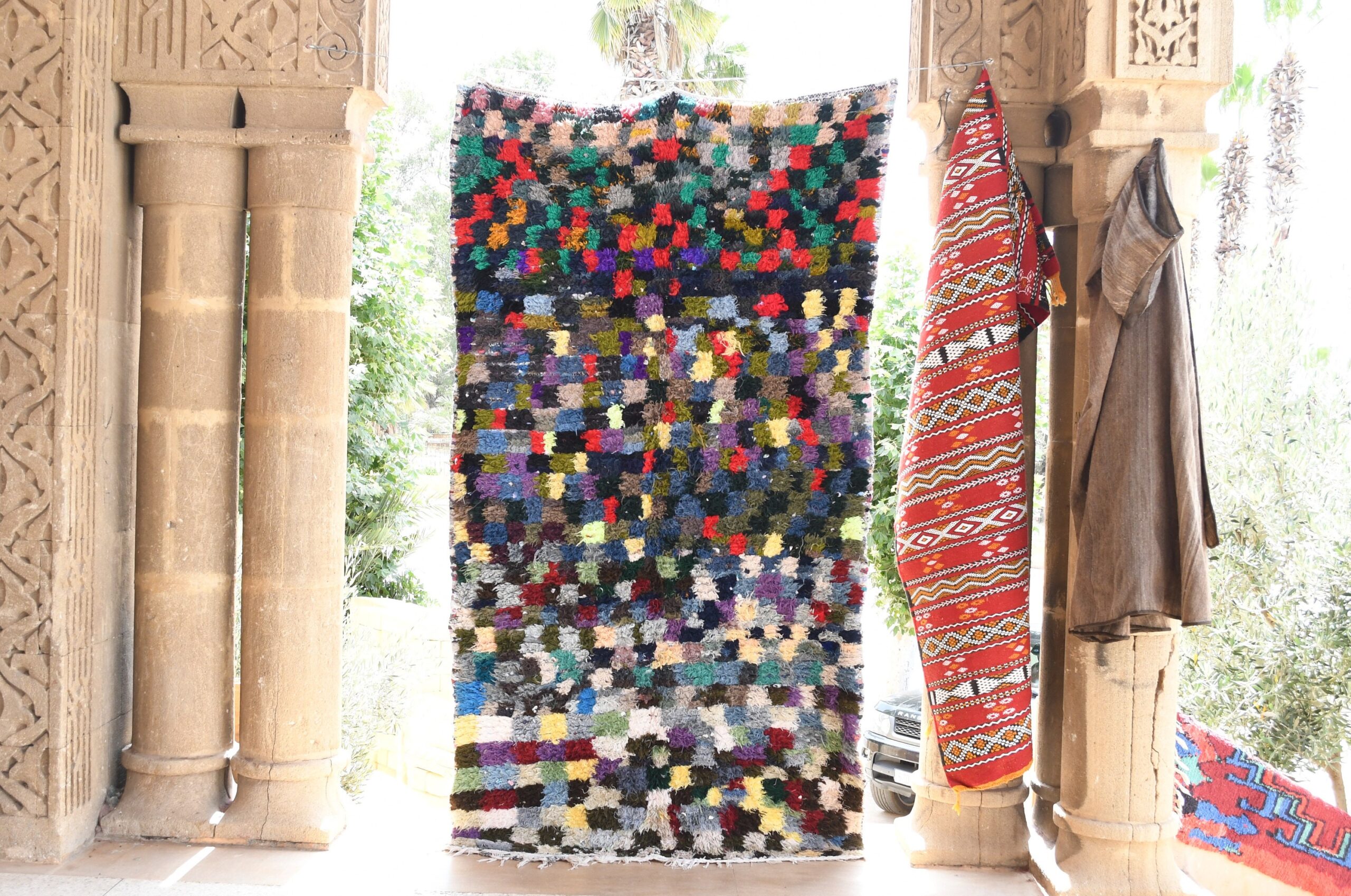 a colorful rug hanging on a wall. il_fullxfull.6076189979_lta7.jpg