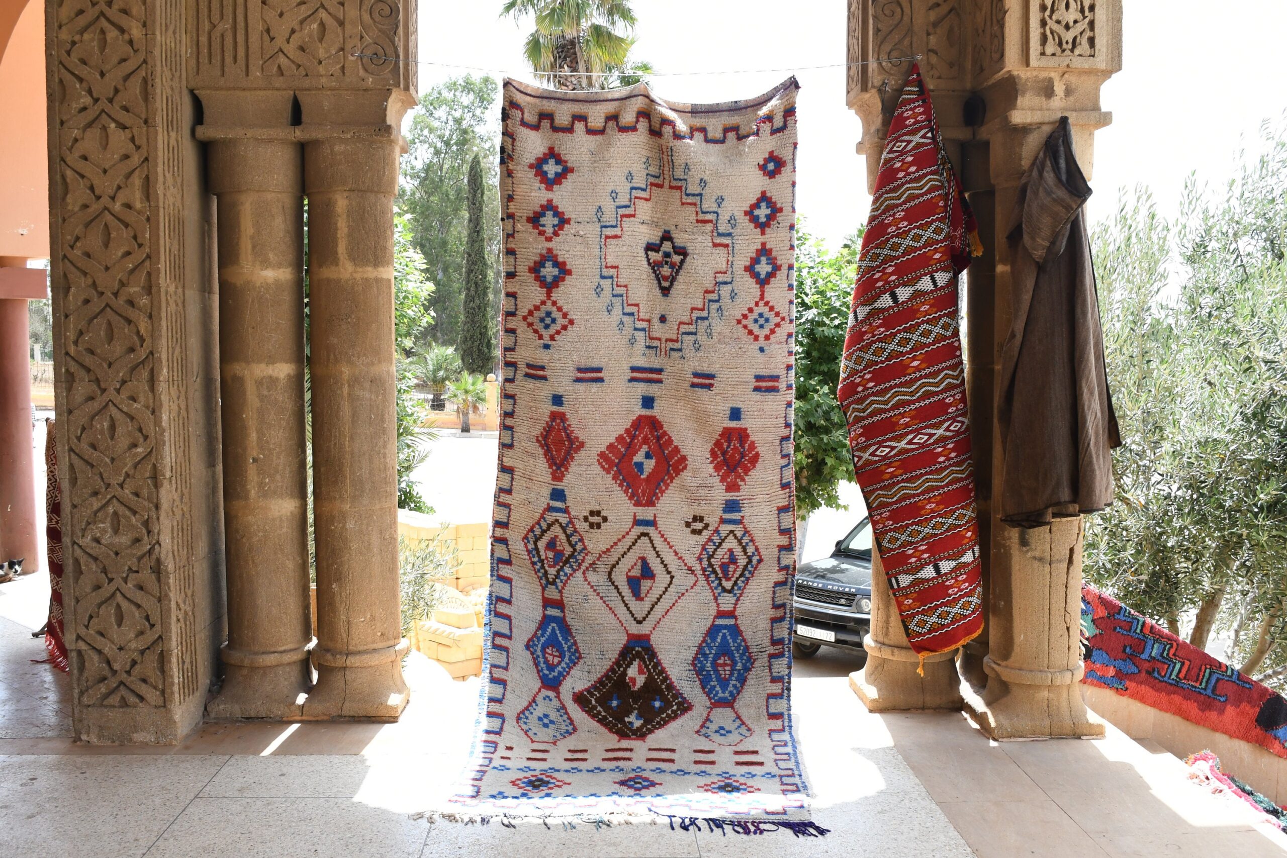 a large rug hanging on a wall. il_fullxfull.6076192799_346y.jpg