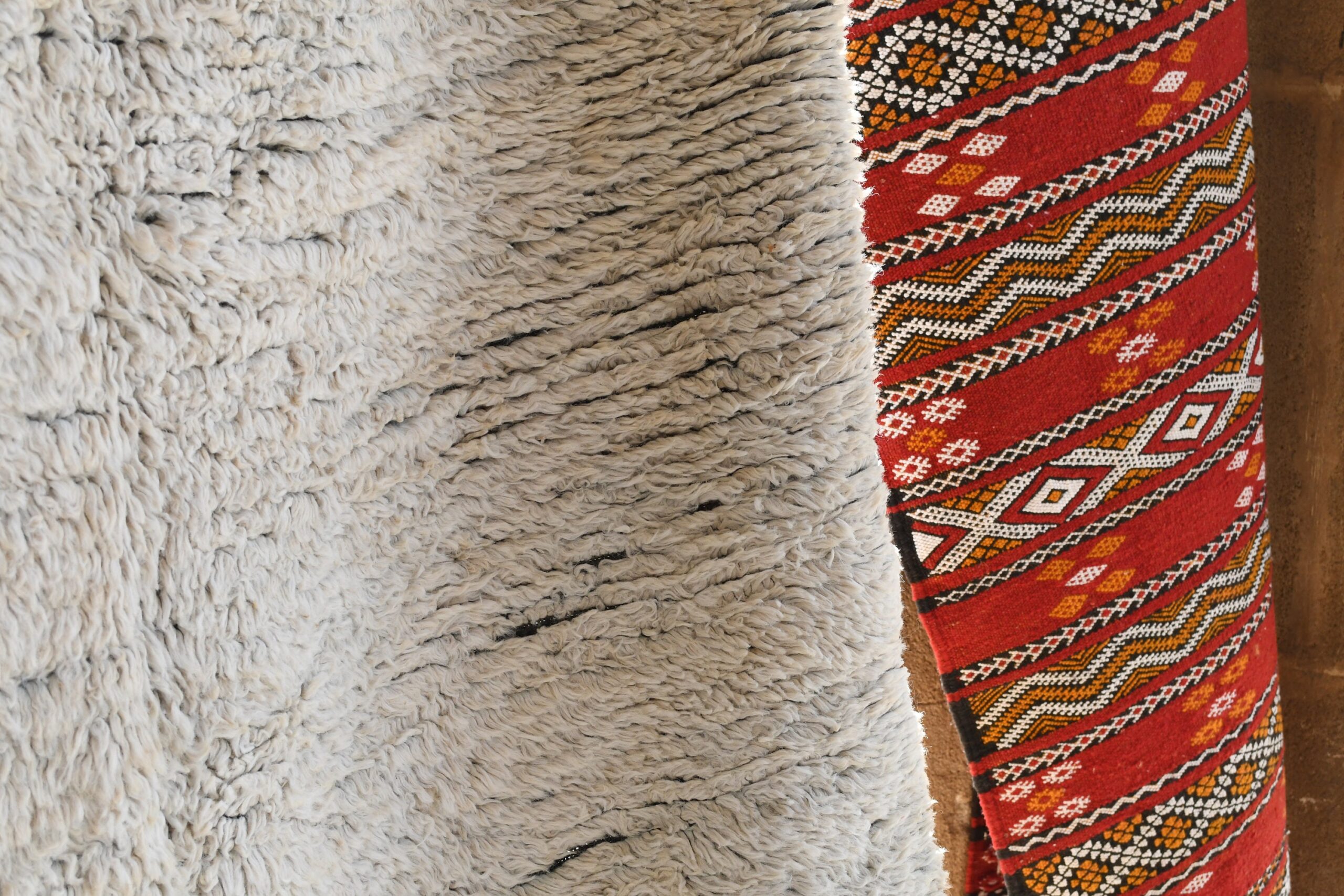 a close up of a rug on a wooden floor. il_fullxfull.6076193269_mywj.jpg