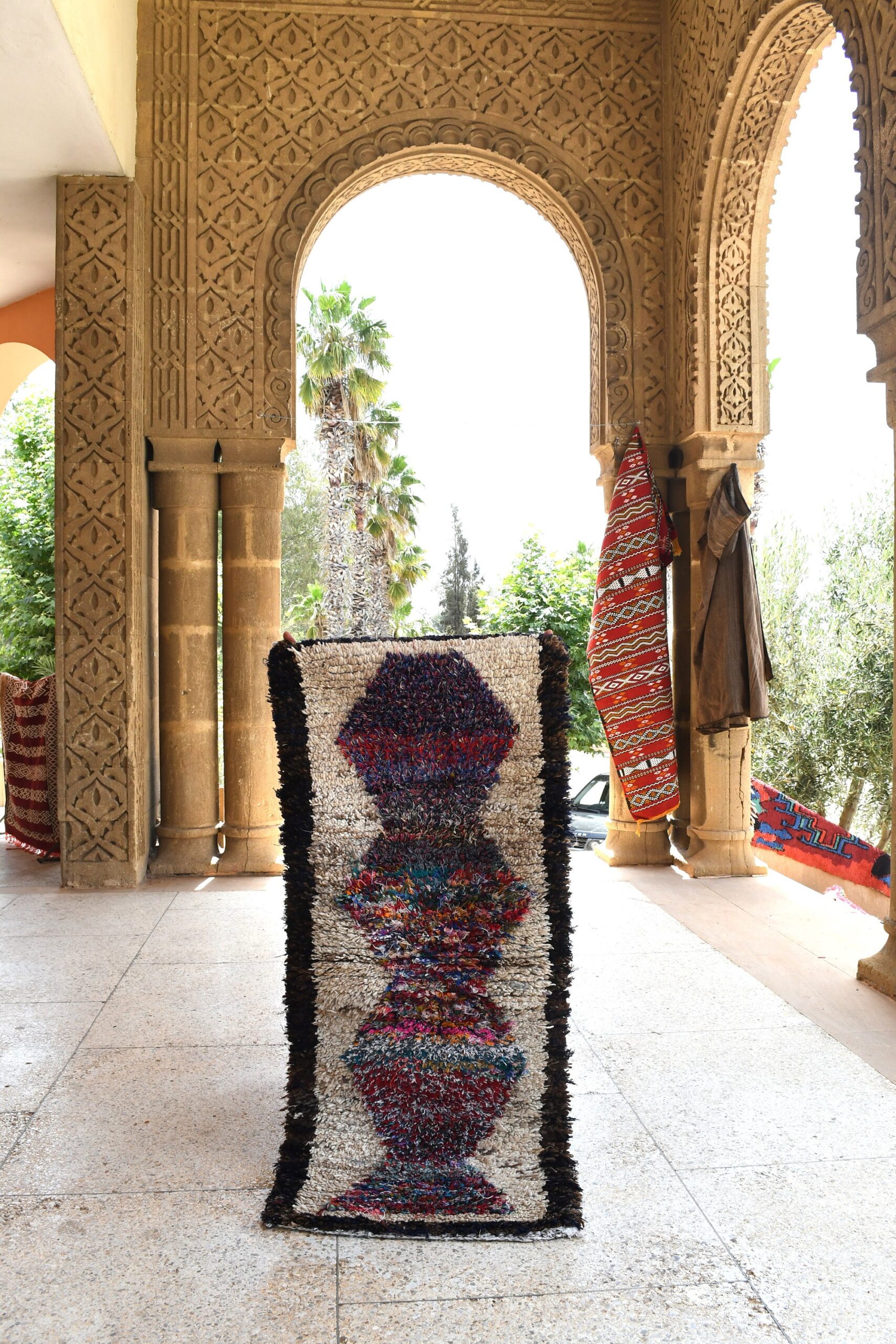 a large rug is on display in a room. il_fullxfull.6076194845_qgrs.jpg