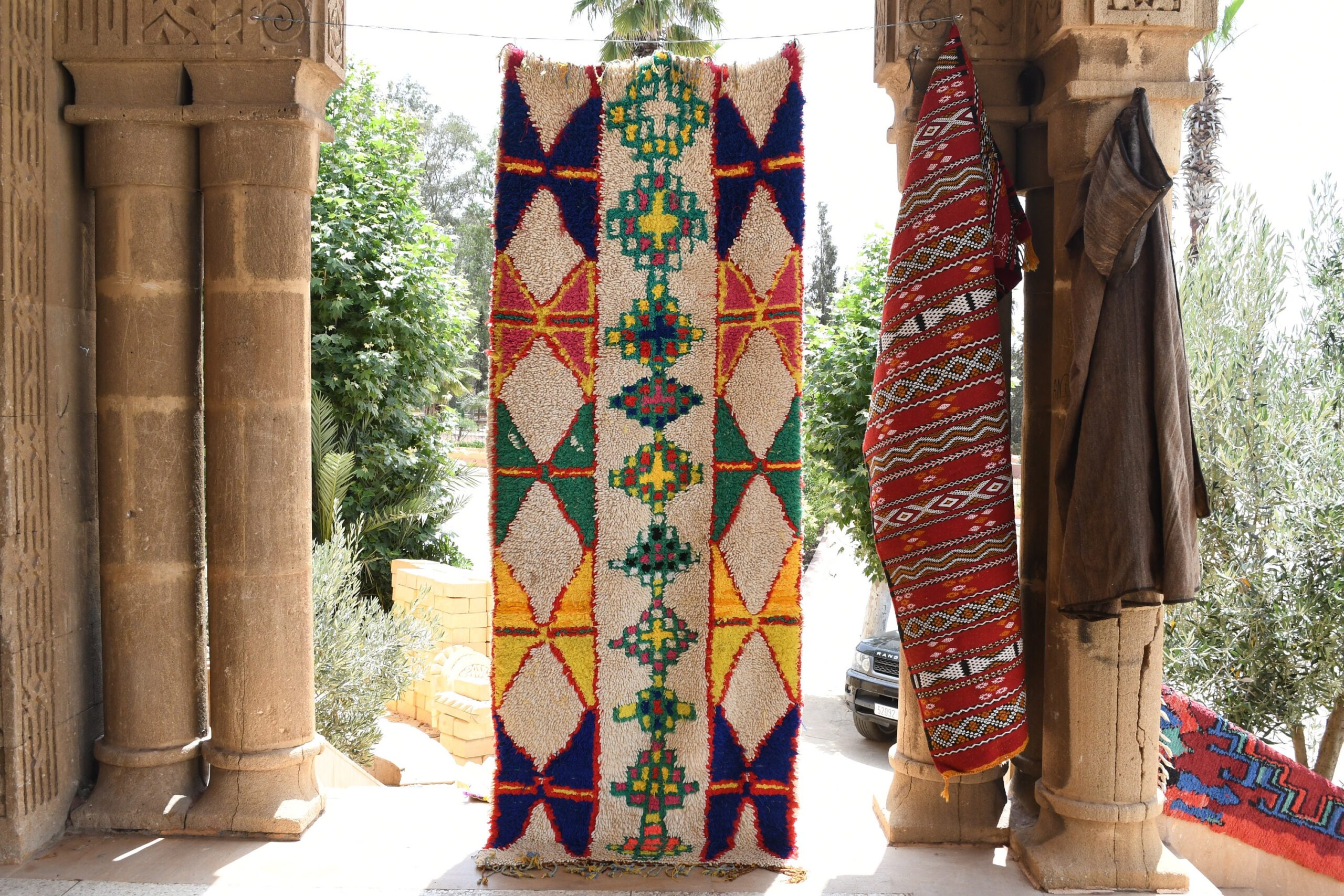 a group of colorfully decorated items in a doorway. il_fullxfull.6076276225_2iag.jpg