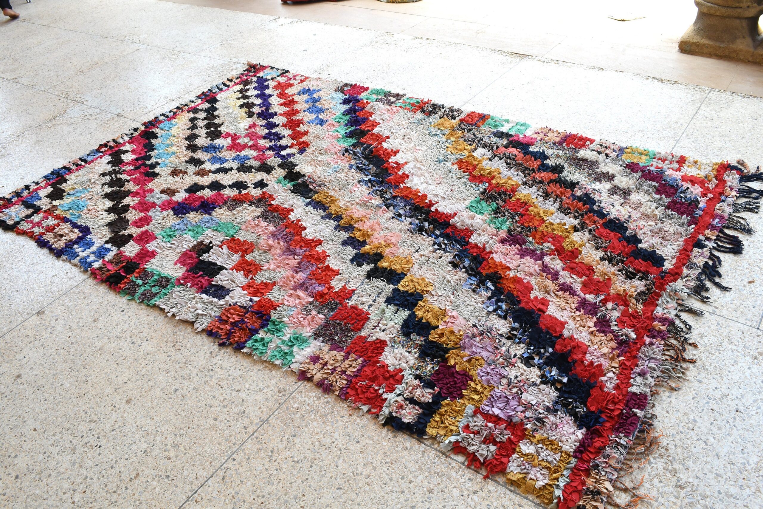 a colorful rug on the floor. il_fullxfull.6076280571_94hn.jpg