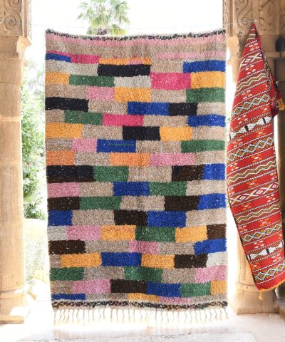 a colorful rug hanging on a wall. il_fullxfull.6076285711_knqj.jpg