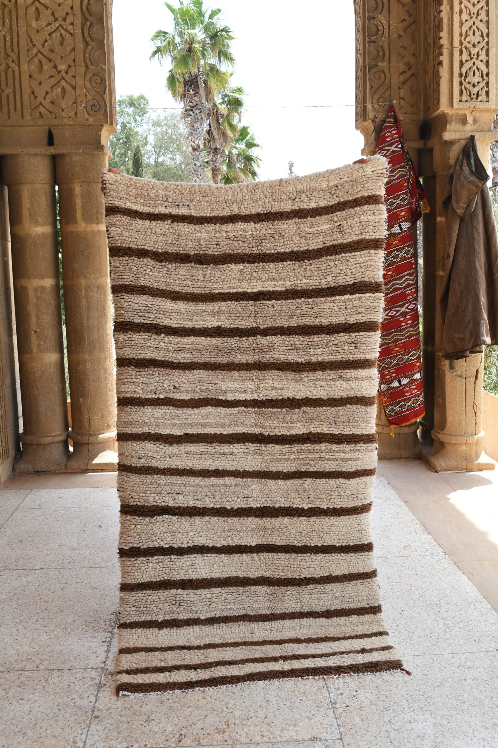 a large rug is sitting on the floor. il_fullxfull.6076294635_t8xb.jpg