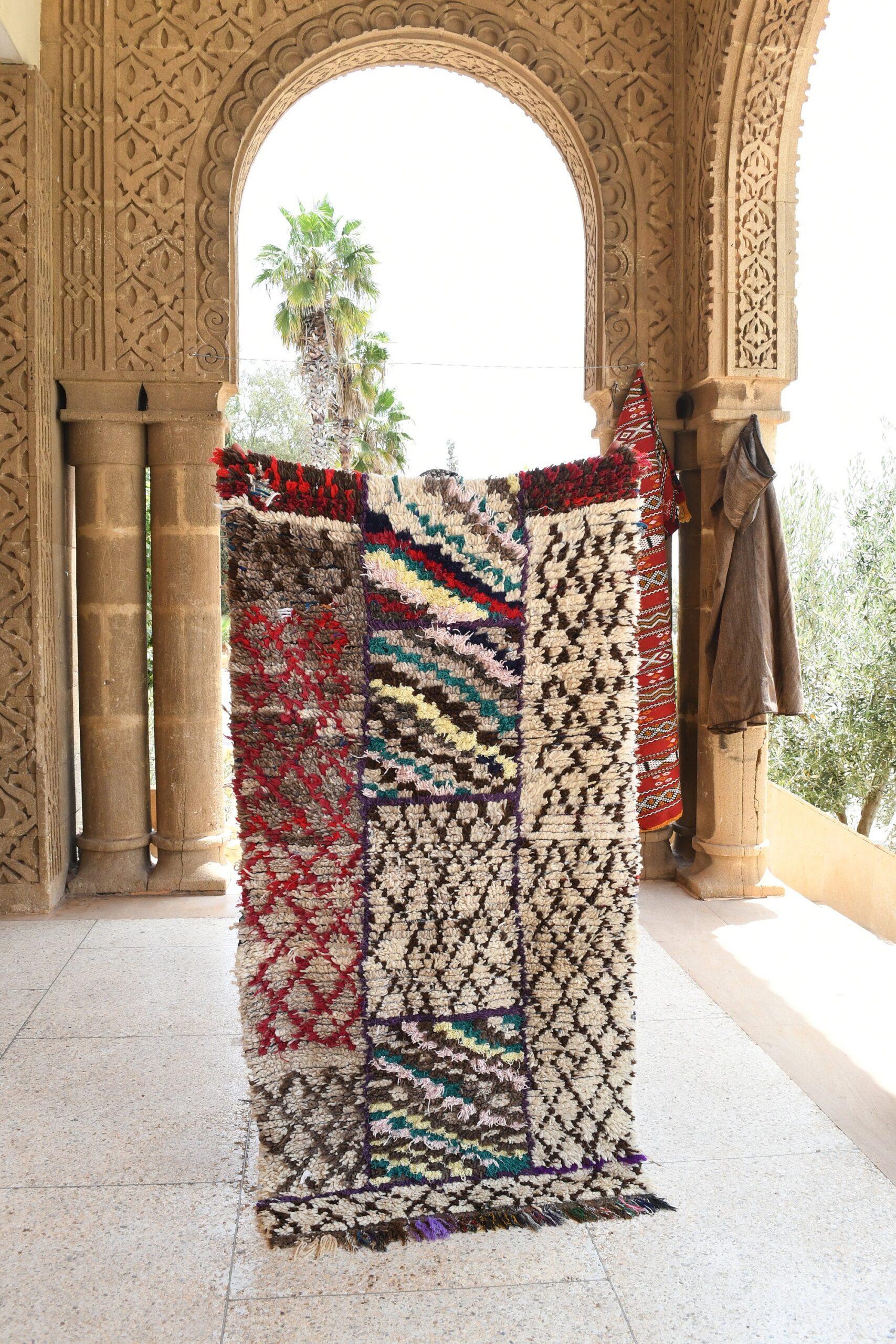 a rug is hanging on the wall. il_fullxfull.6076296337_rq8x.jpg