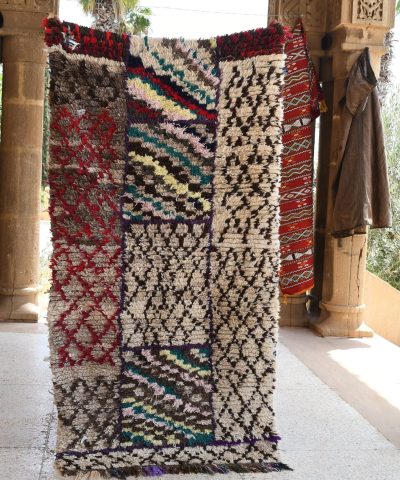 a colorful rug hanging on a wall. il_fullxfull.6076296735_sskp.jpg