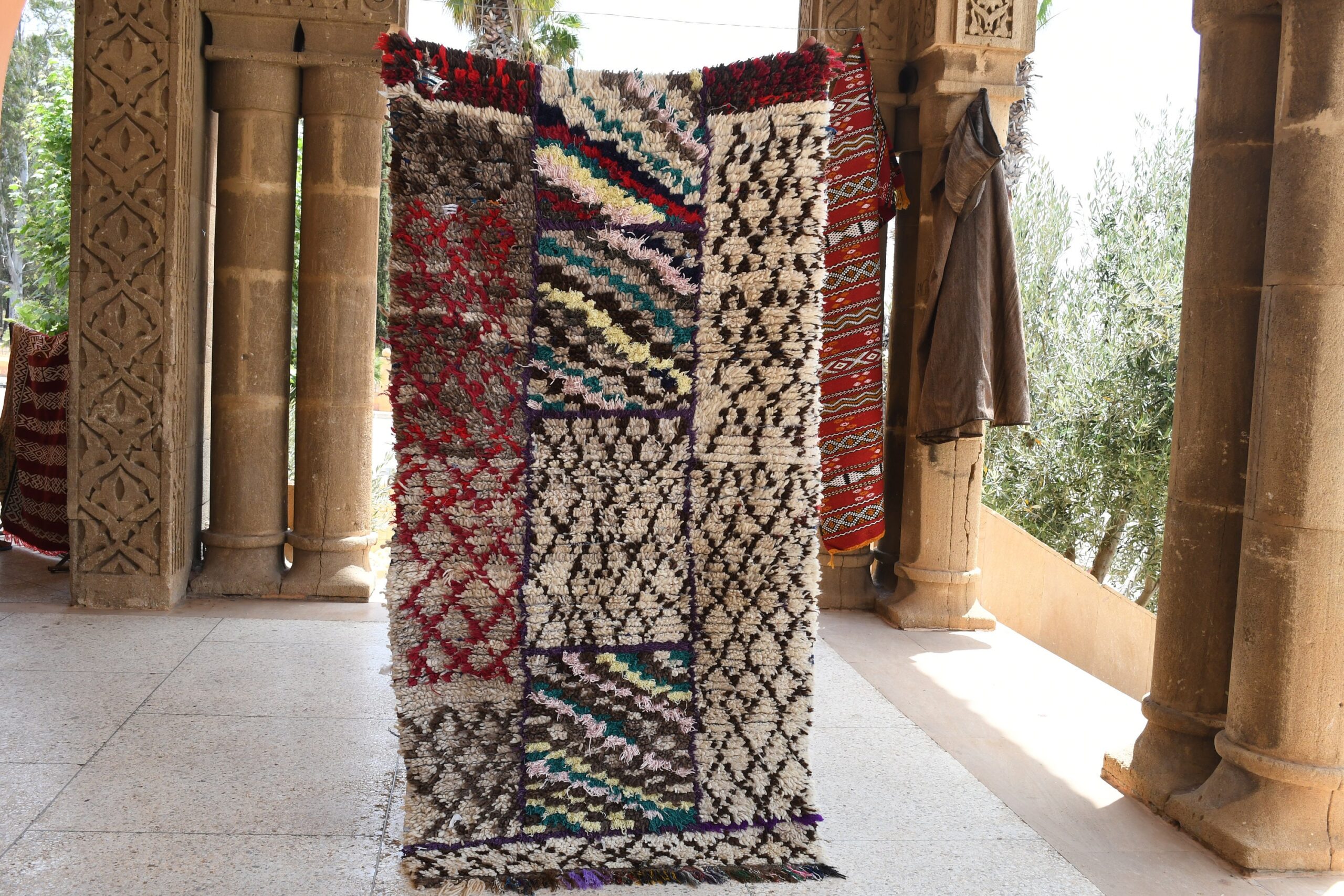 a colorful rug hanging on a wall. il_fullxfull.6076296735_sskp.jpg