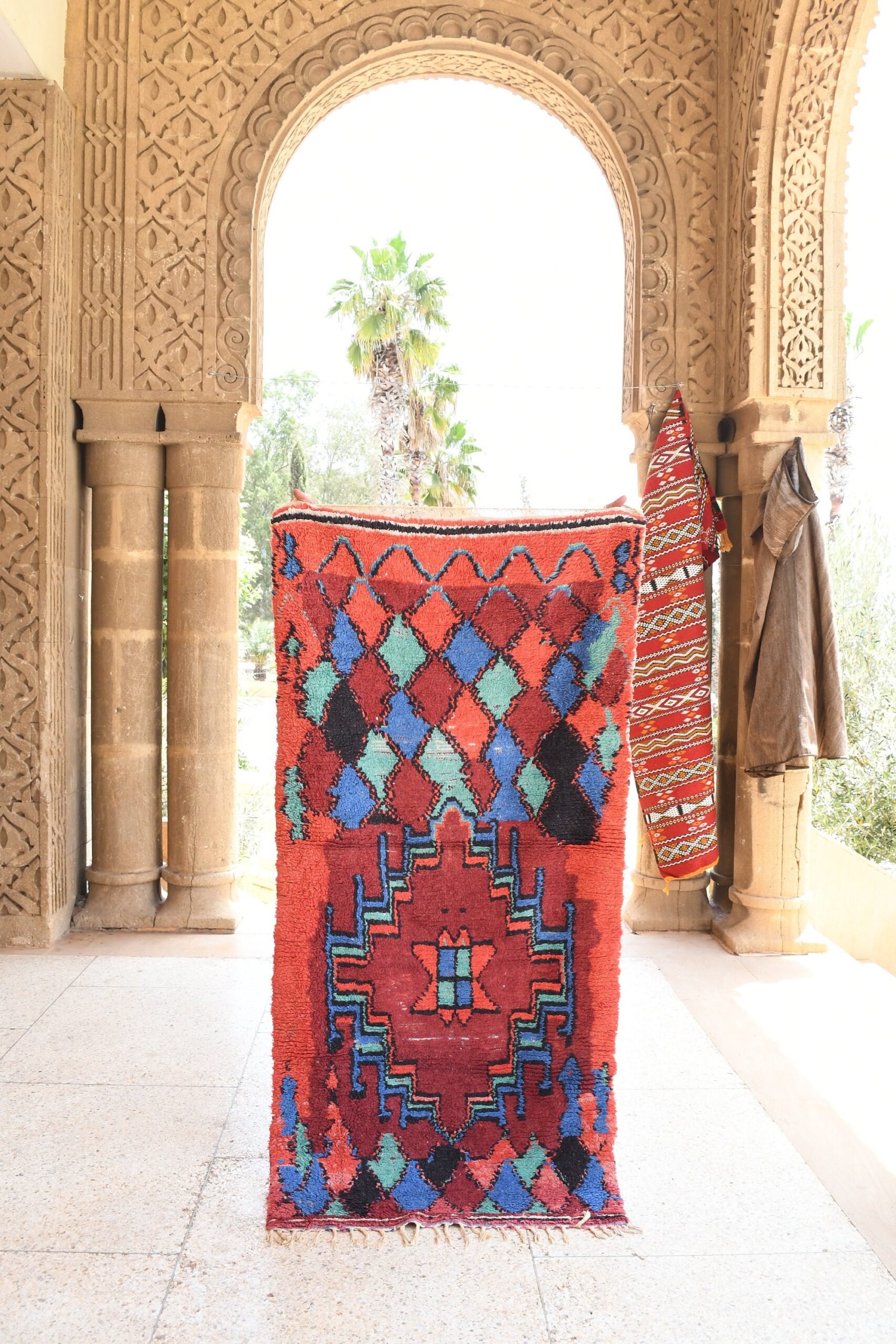 a colorful rug hanging on a wall. il_fullxfull.6076298121_7c9r.jpg
