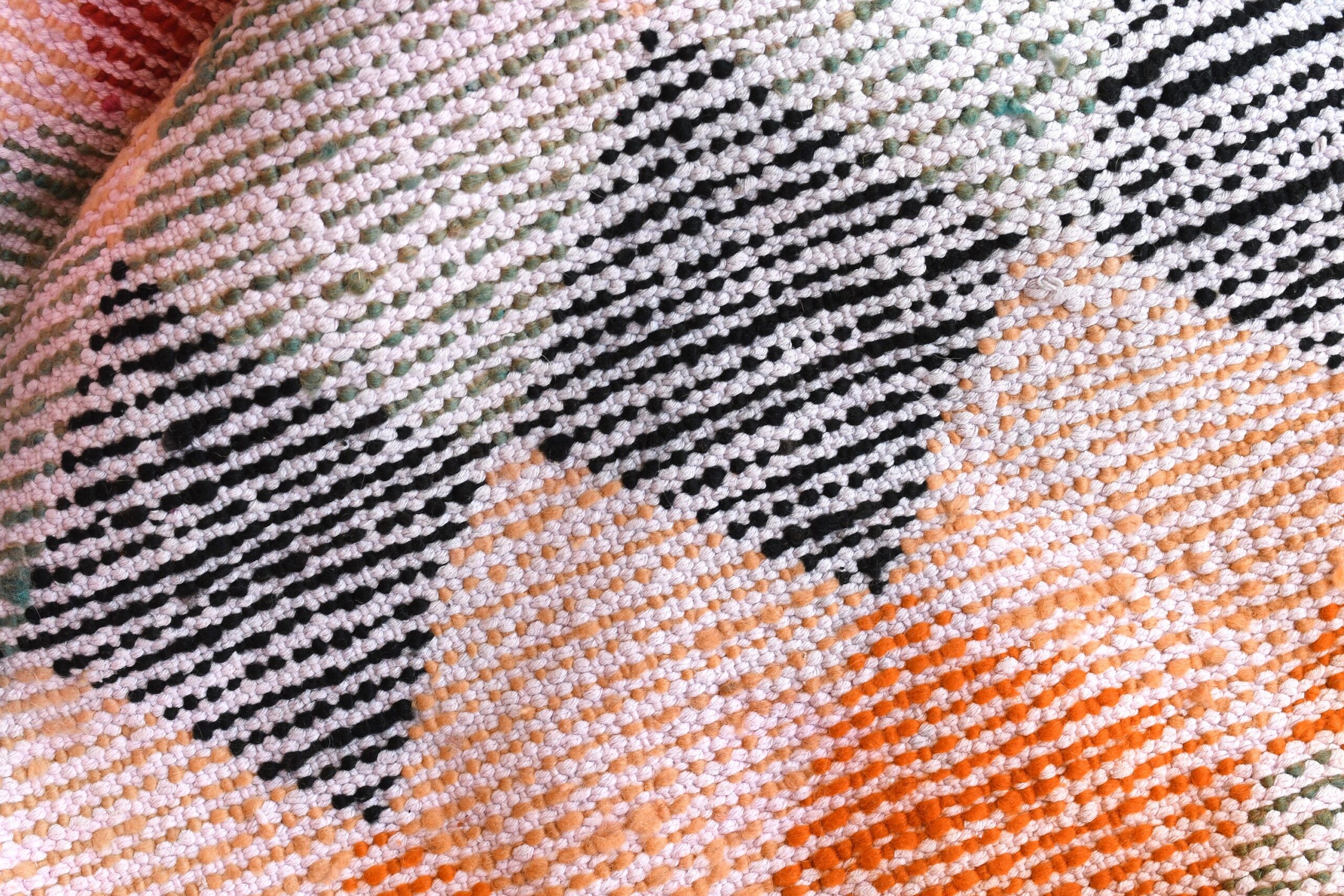 a close up of a colorful moroccan rug. il_fullxfull.6076301909_d828.jpg